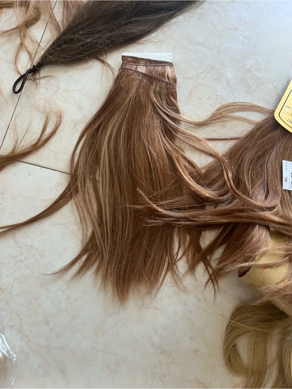 Source Unknown Mixed Blonde and Light Brown Human Hair Extensions
